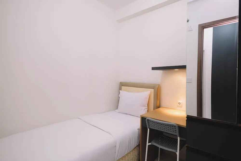 Simple and Cozy Living 2BR at Podomoro Golf View Apartment