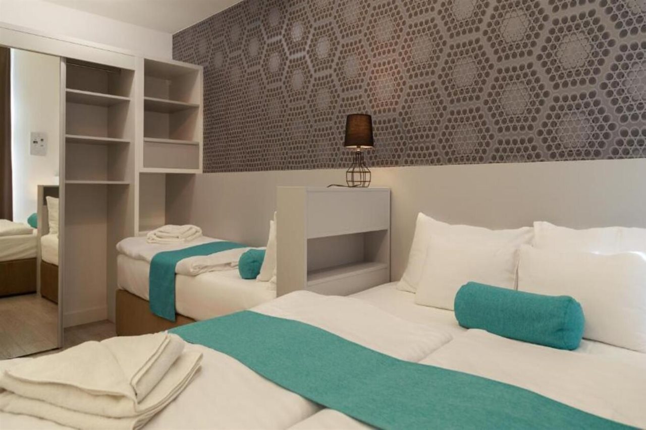 Foto - Hotel Mika Downtown