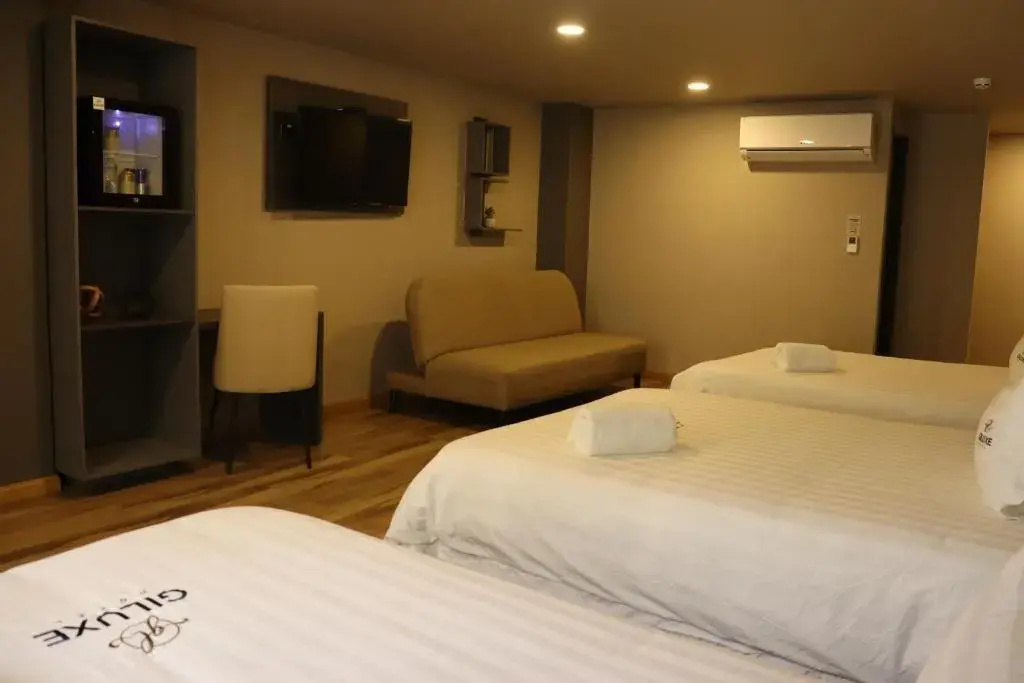 Foto - Giluxe Hotel