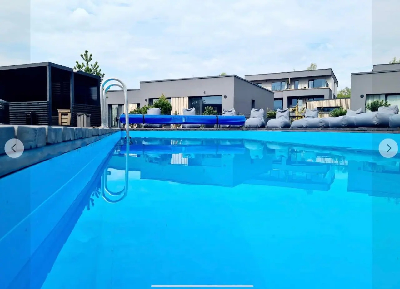 E&K apartamentai su sildomu baseinu kieme