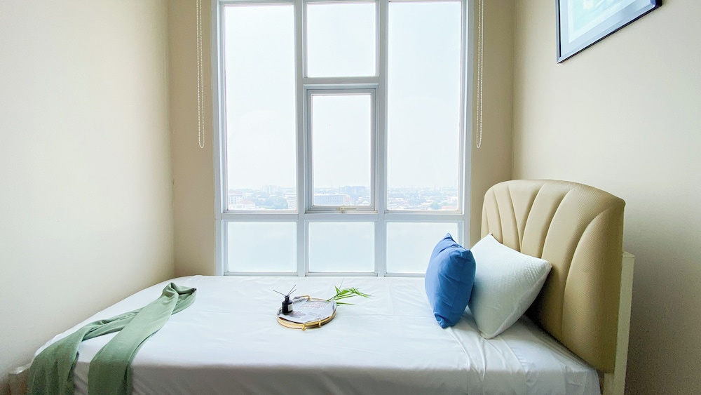 Modern Look 2Br At Lucky Tower Residence Apartment