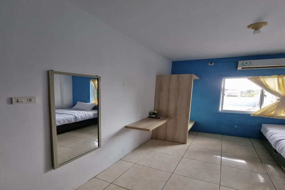 Foto - Hotel O Wira Residensia Syariah