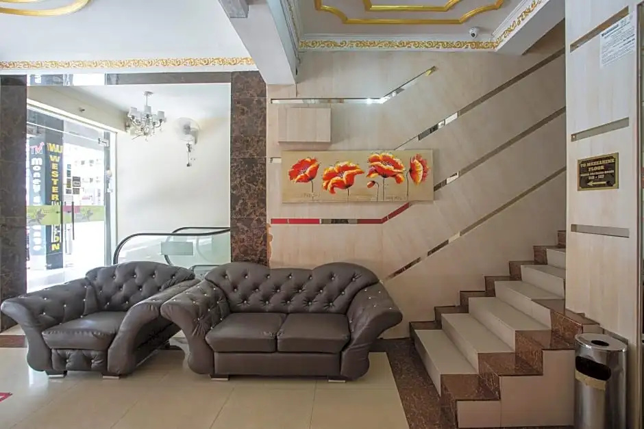 Photo - Capital O Hotel Grand Orchard