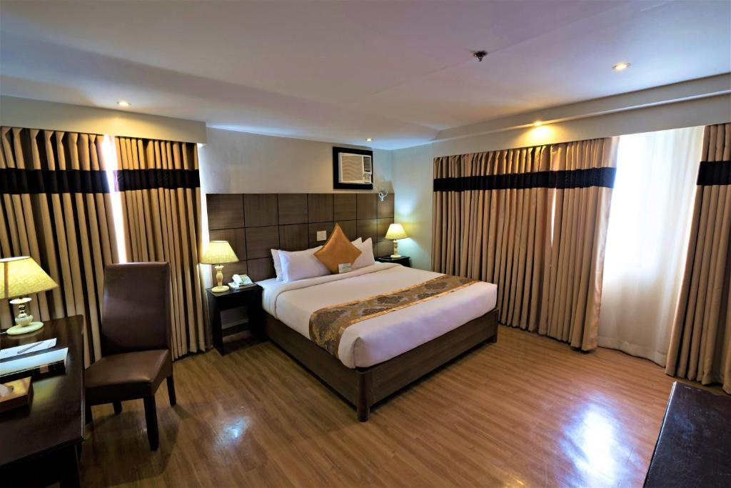Foto - The Pinnacle Hotel and Suites
