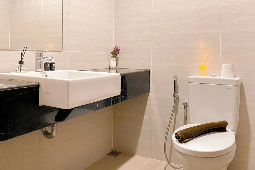 Homey And Cozy Living Studio At West Vista Apartment