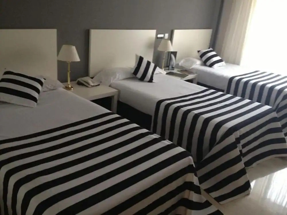 Photo - Esentia Togumar - Triple 3 Adults