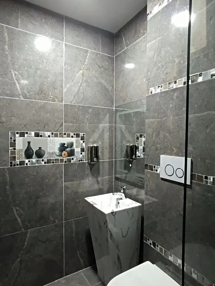 Foto - Hostal Kapital City