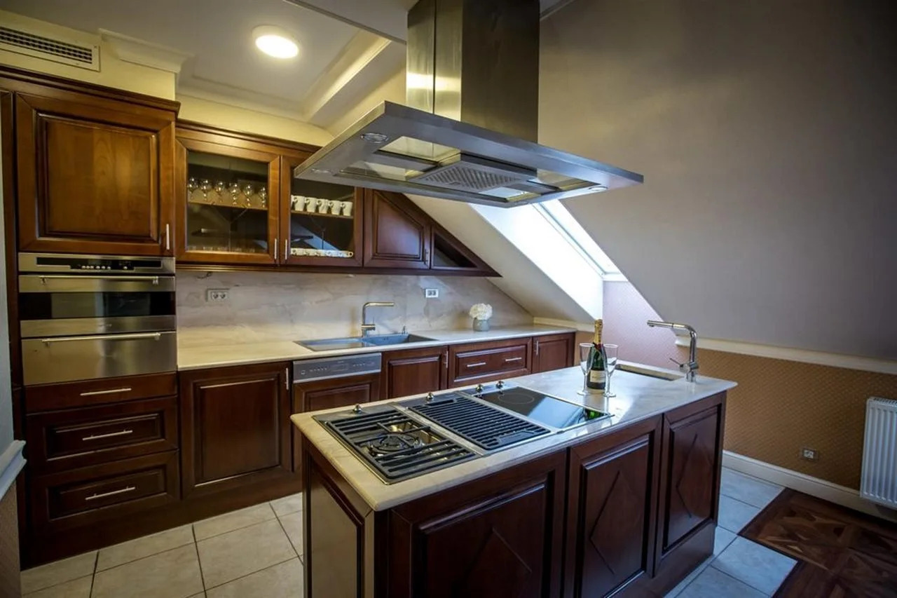 Foto - Queen's Court Hotel & Residence