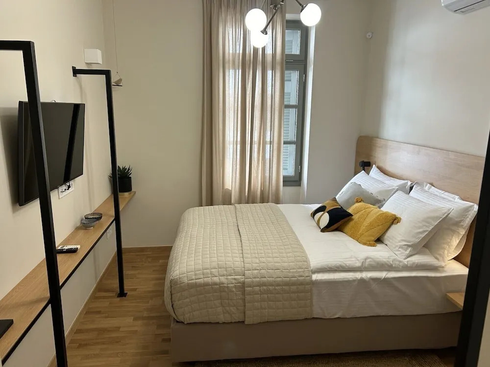 Foto - Living Yard Acropolis Apartments