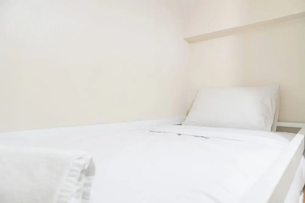 Minimalist and Restful 2BR at Podomoro Golf View Apartment