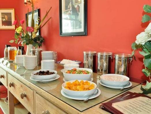 Foto - Waterloo Town House & Suites