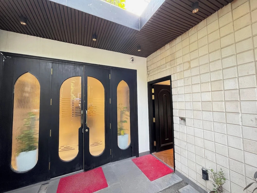 Foto - Bedchambers Stay near Select Citywalk, Saket