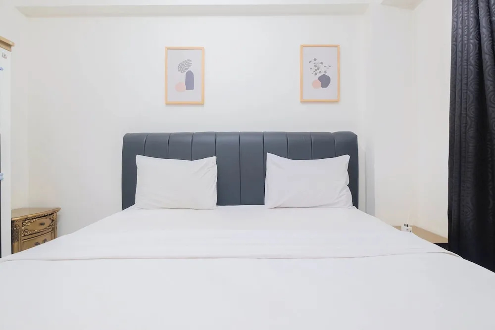 Comfort and Homey 2BR at Podomoro Golf View Apartment