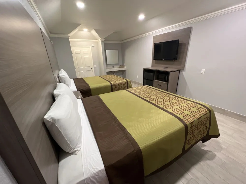 Foto - Kiwi Inn Capital O Houston - Hwy 249