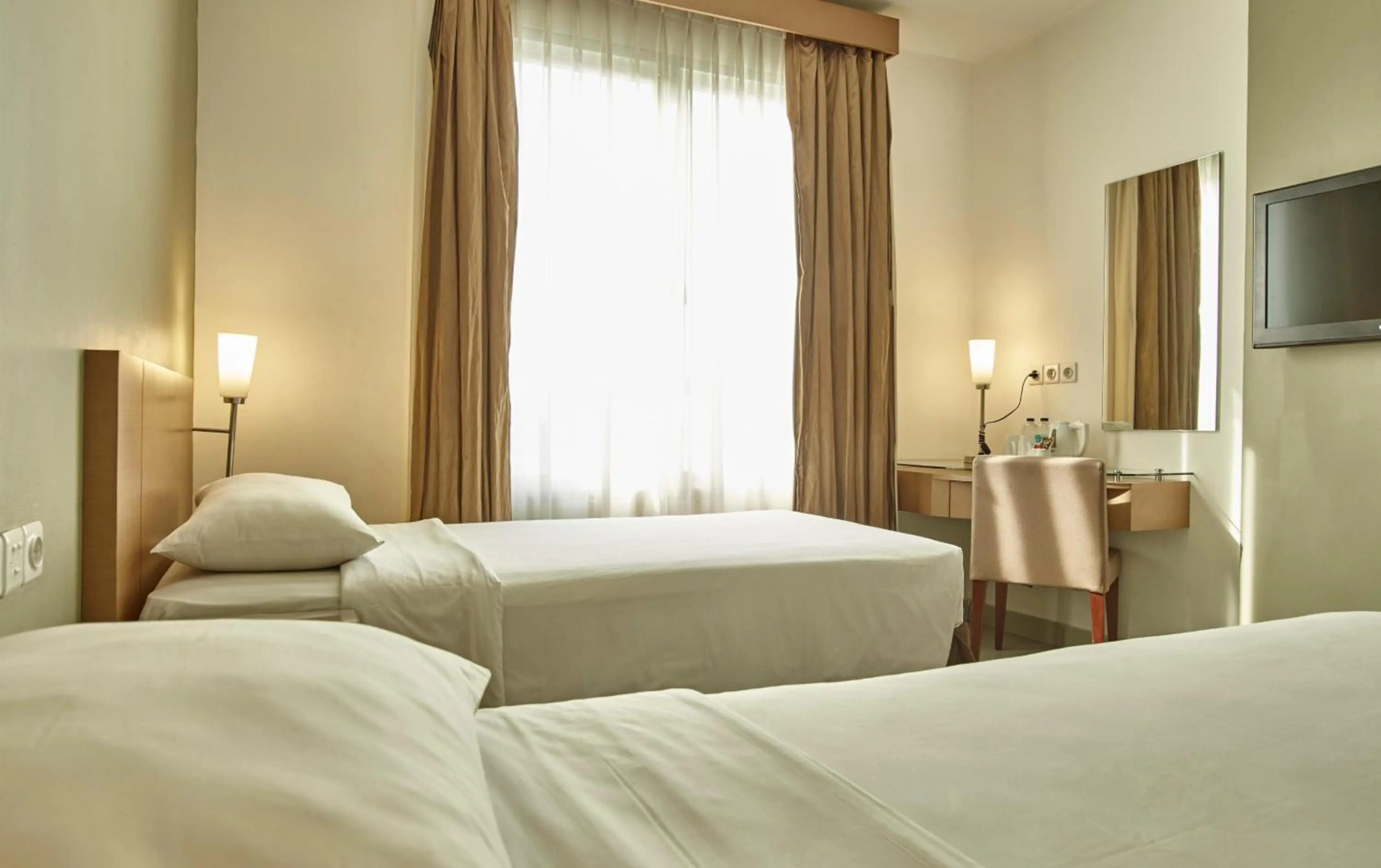 Foto - Triniti Hotel Gajah Mada