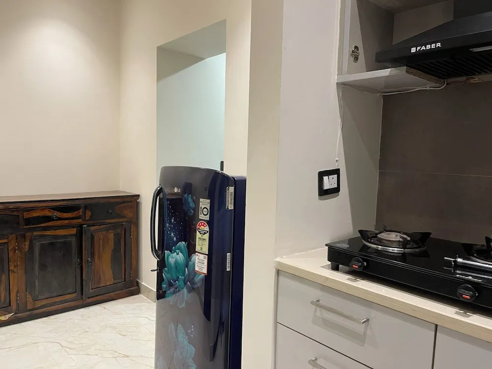 Foto - Bedchambers Stay near Select Citywalk, Saket