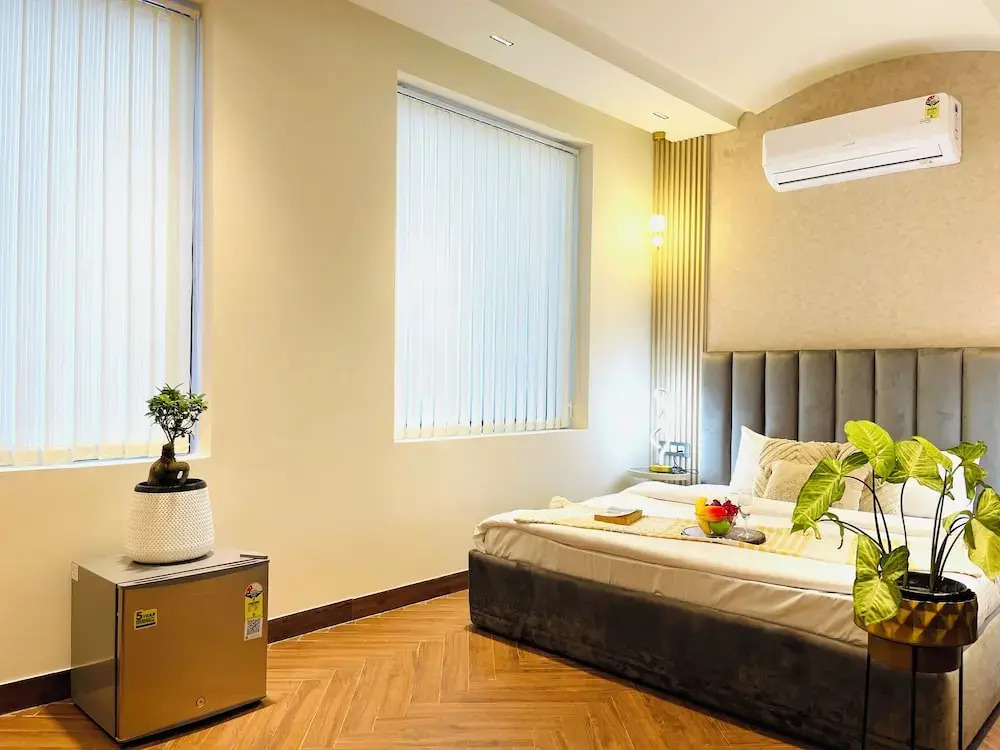 Foto - Bedchambers Stay near Select Citywalk, Saket