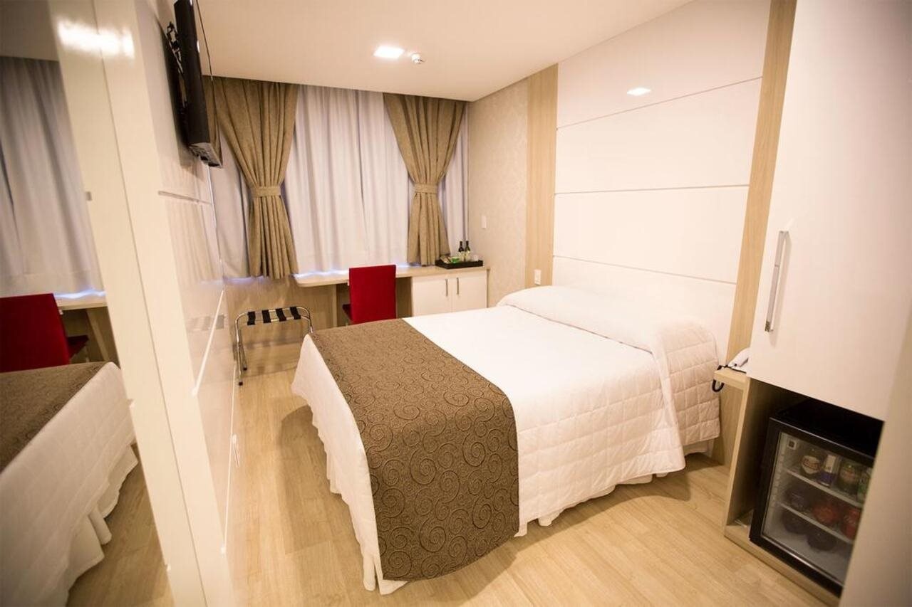 Holiday & Business Hotel - Ao lado do Centro de Eventos e Arena Conda