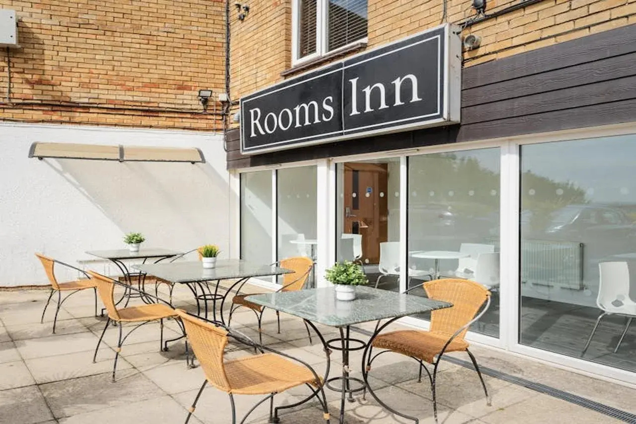 Foto - Rooms Inn