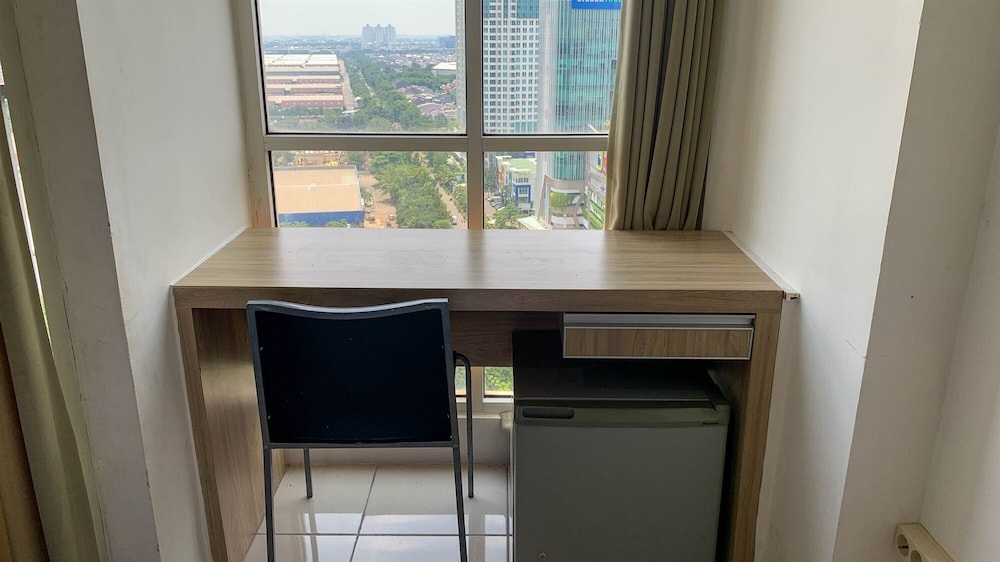 Cozy And Tidy Studio At Tifolia Apartment