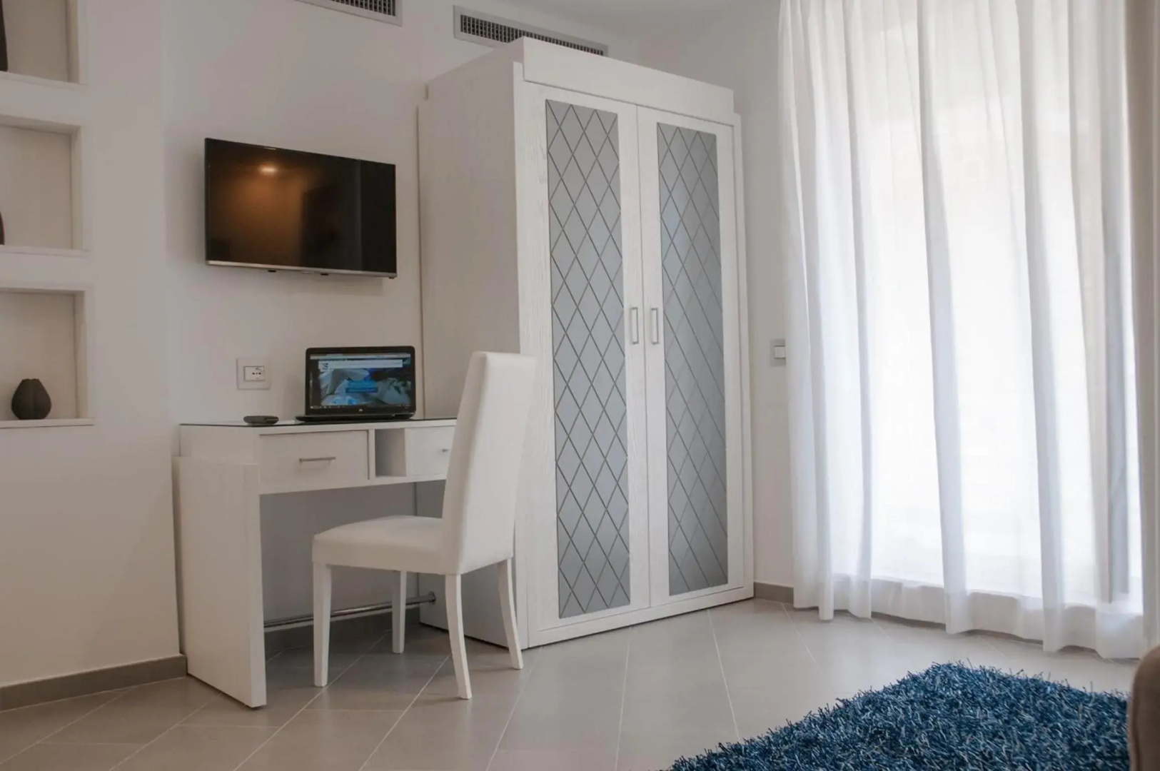 Foto - Hotel Tasso Suites & Spa