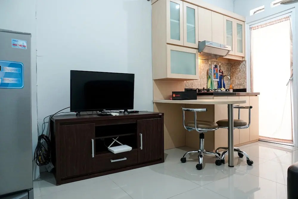 Tranquil Green Pramuka 2BR Apartment near Shopping Center