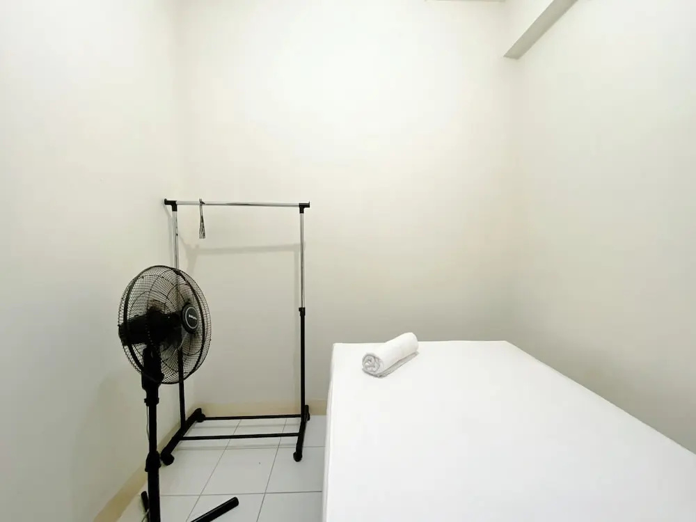 Tidy and Warm 2BR at Podomoro Golf View Apartment