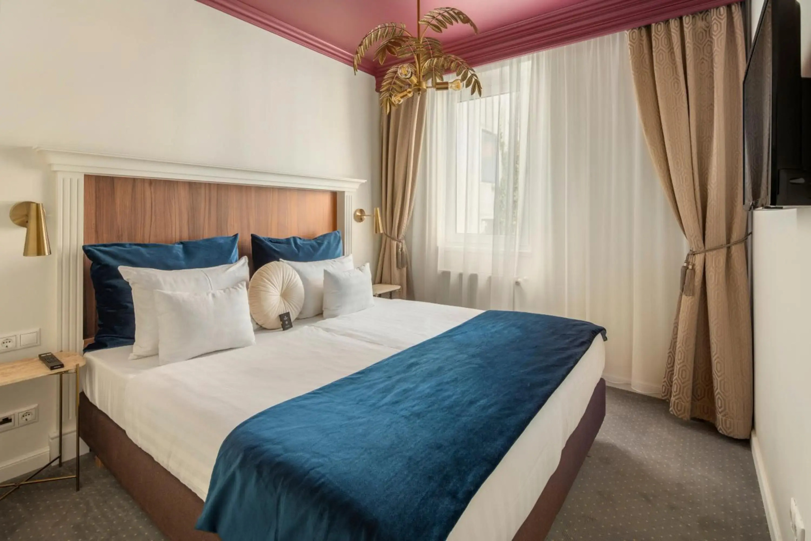 Foto - Queen's Court Hotel & Residence