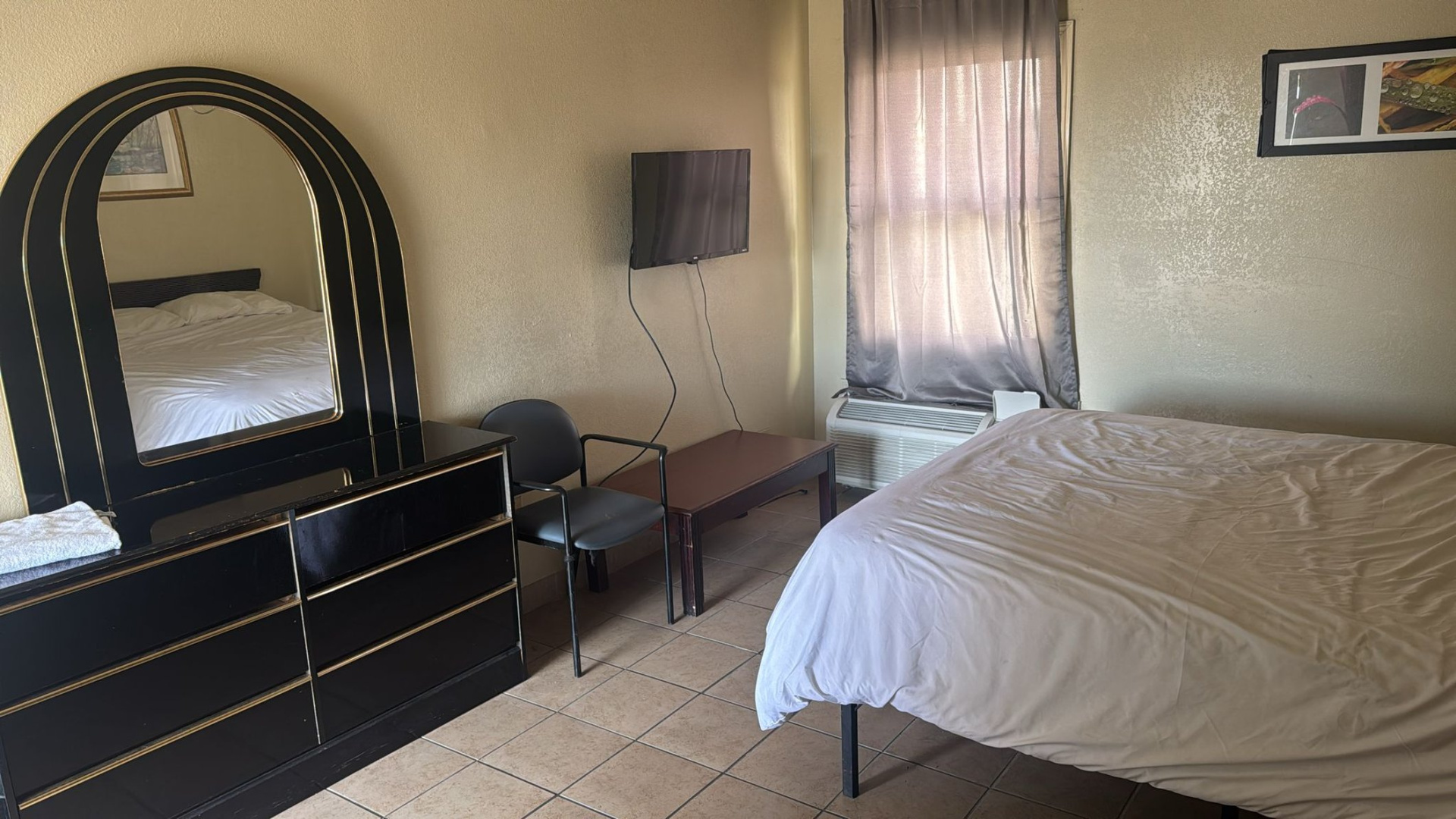 Foto - Cole Manor Motel By Oyo Love Field Market Center
