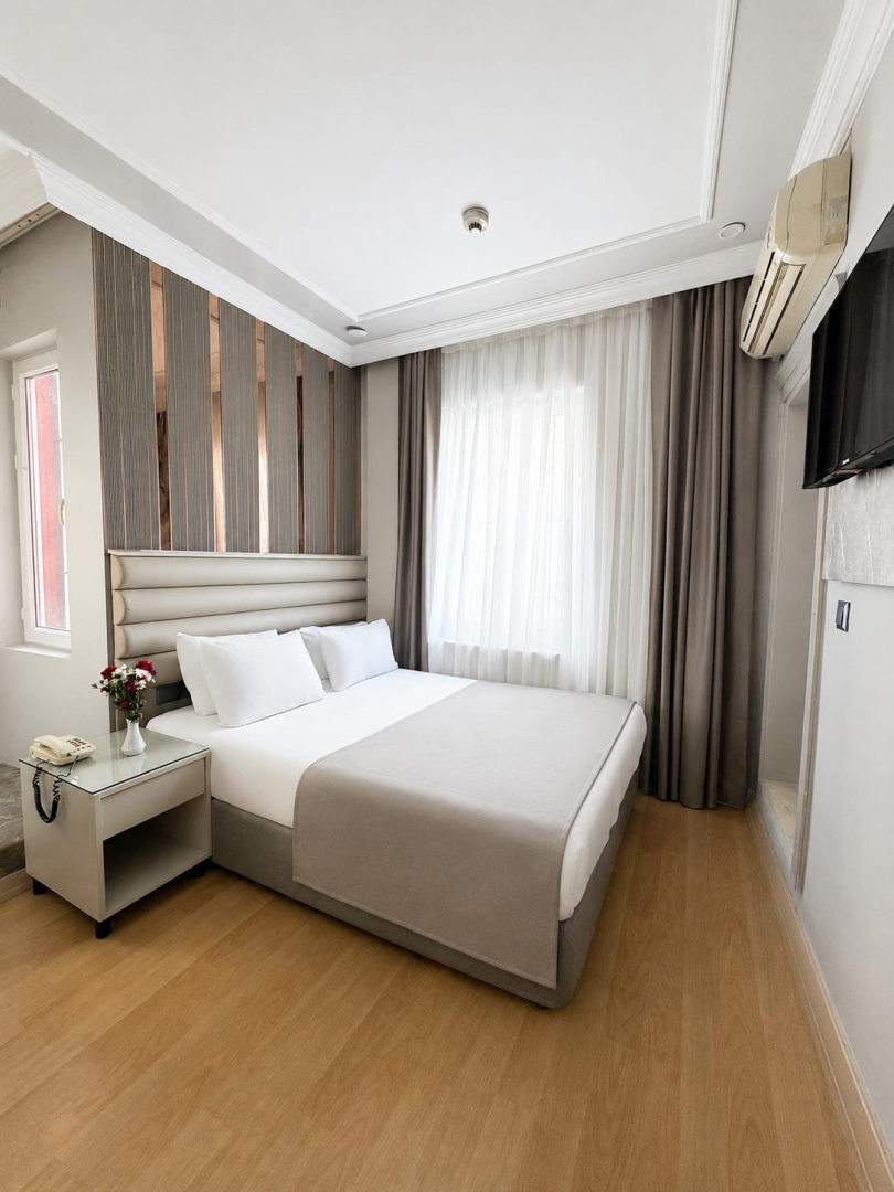 Foto - Crowned Plus Hotel