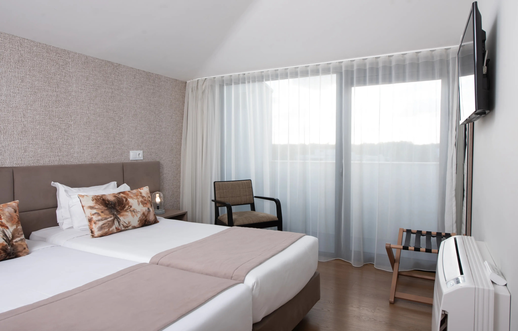 Foto - Essence Inn Marianos Hotel