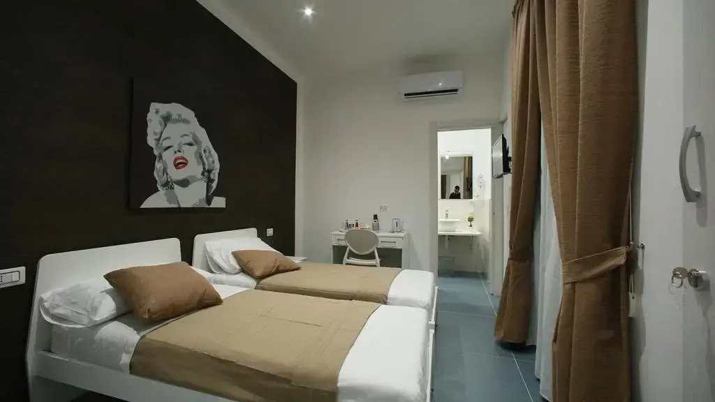 Foto - Mascalzone latino luxury rooms