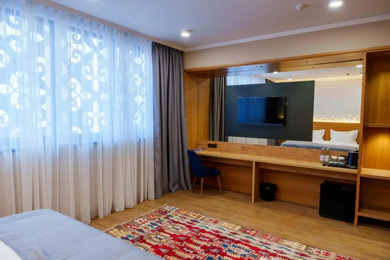 Foto - Dami Almaty Hotel