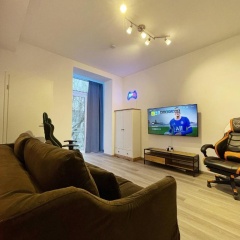 PS5+55 Zoll 4K Fernseher - Gaming Apartment - Bild 1