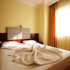 Minta Apart Hotel - Bild 7