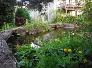 "Wohnen im Garten der Sinne"