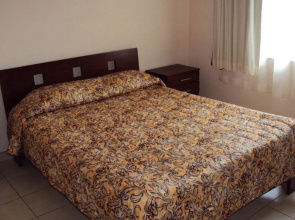 Tropical Gardens - Suites and Apartments