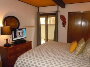 Two-Bedroom plus Den Deluxe Unit #124 by Escape For All Seasons