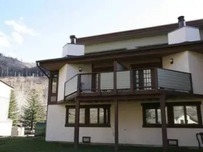 Townhome with Covered Parking Space & Fireplace by RedAwning