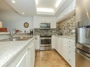 Beautifully Furnished Gulf-Front Condo Just a Walk to the beach by RedAwning