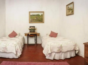 La Casa de Adobe Natural y Más