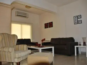 Les Palmiers City Center House
