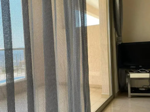 Relaxing 1 bedroom condo with pool and sea view