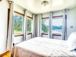 Boho Waterfront Getaway 5 Bedroom Retreat