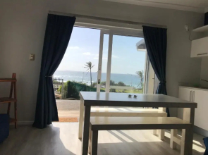 Exclusive Beachfront Apartment with sea views