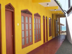 Malika's Yellow House