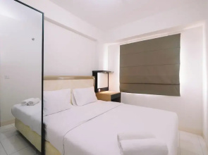 Simple and Cozy Living 2BR at Podomoro Golf View Apartment