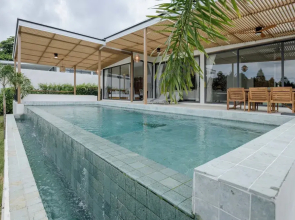 Tropical Poolside Retreat by Sea N' Rent