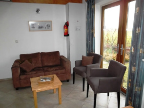 Detached Bungalow With Stove Located in the Betuwe