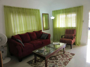Caymanas Estate Neighbor